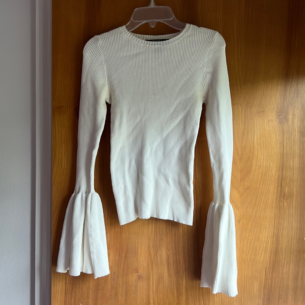 White ribbed bell sleeve sweater